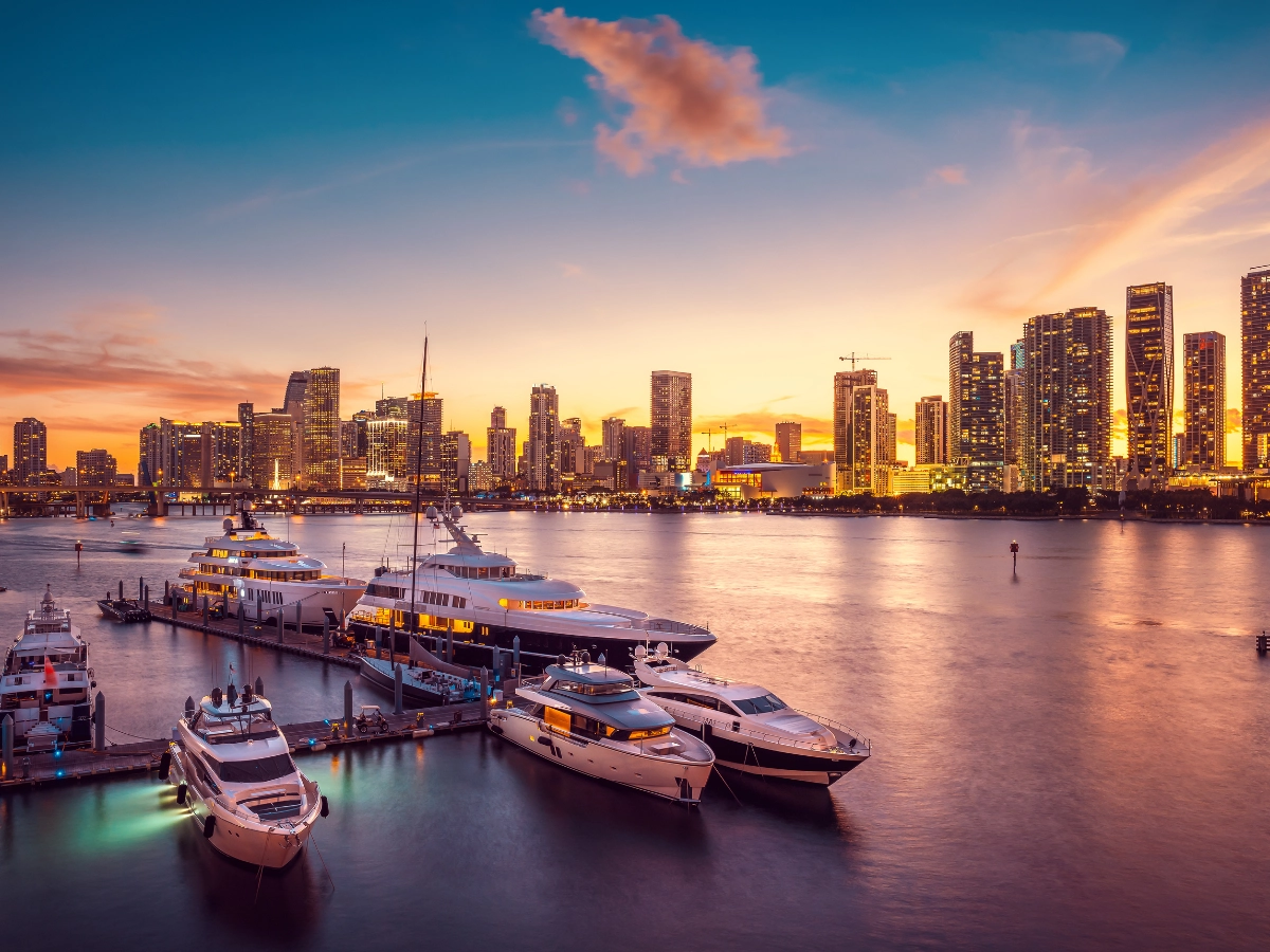 Florida Yacht Charter - Luxury yacht dock near Miami at sunset
